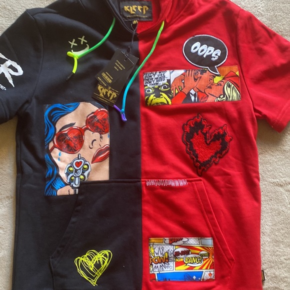 I'm selling a brand new sweater, black and red really nice designs - Picture 3 of 4